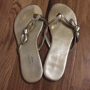 Talbot gold sandals with bows